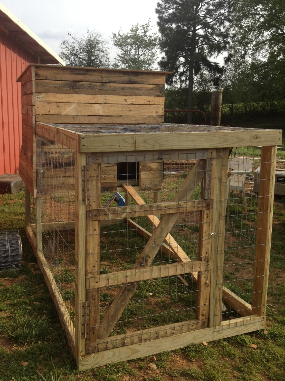  think the pallets give the chicken coop a rustic country feel