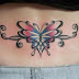 Flower Tattoo Design On Women Back Spinal