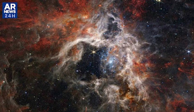 A Nebulosa da Tarântula está localizada na Grande Nuvem de Magalhães e foi fotografada em detalhes sem precedentes com a câmera de infravermelho próximo (NIRCam) do JWST © NASA, ESA, CSA, STScI, Webb ERO Production Team