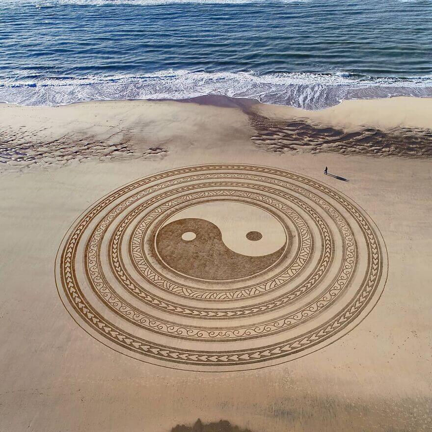 10-Yin-and-Yang-Mandala-Sand-Drawings-Jben-Beach-www-designstack-co