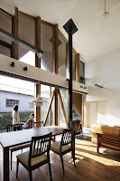 Origami House Design with A-Frame in an Old Village Surrounded by Mountains
