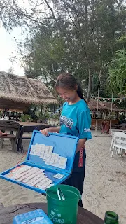 Lottery selling girl in Sam Roi Yot