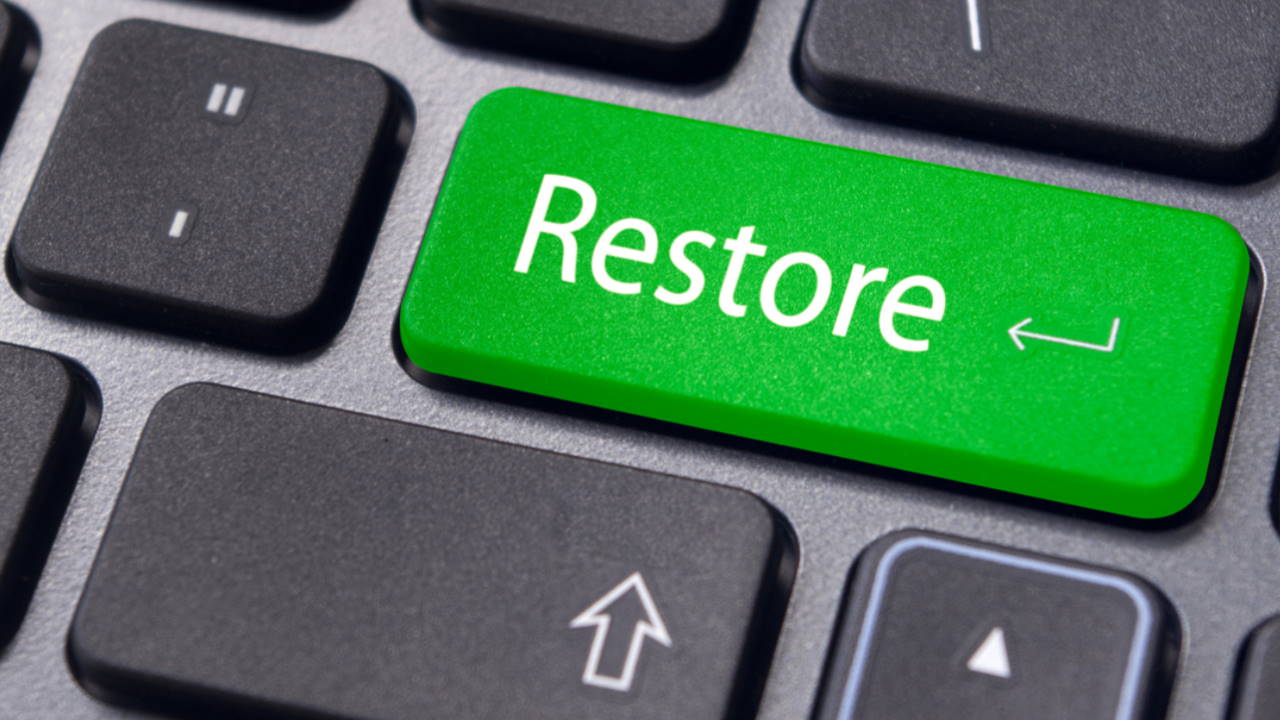 Menggunakan System Restore