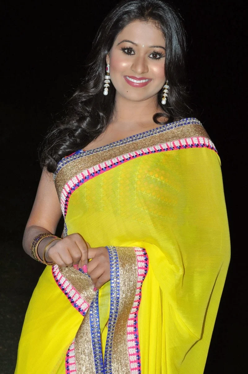 Manalee Hot Navel Show Photos In Yellow Saree