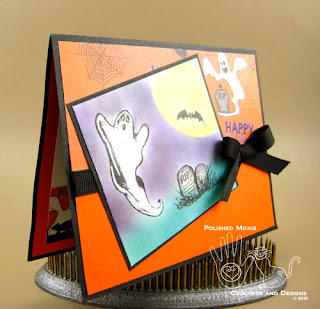 Picture of the front of the Halloween card set at an angle to show dimension of the card