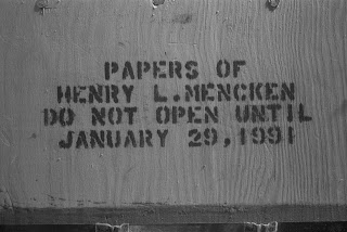 A wooden box printed with "Papers of Henry L. Mencken do not open until January 29, 1991." 