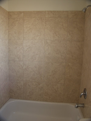 Guest Bathtub and Tile Work
