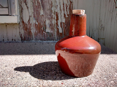 Image of handmade oxblood glaze ceramic bottle