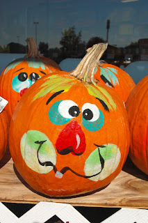 pumpkins with painted faces.