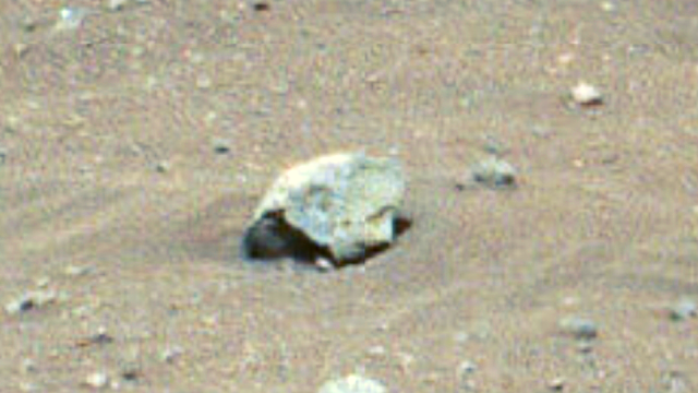 Mars head of a statue found on a Mars riverbed by NASA Rover.