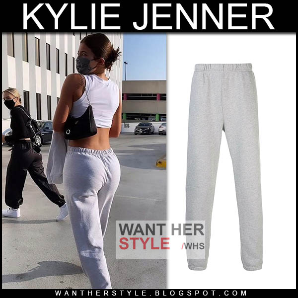Kylie Jenner in grey sweatpants and white crop top