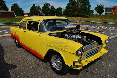 classic yellow car with open hood