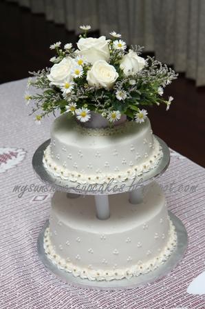 2 tier white wedding cake for cik Zabedah selamat pengantin baru semoga 