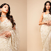 Nora Fatehi ethnic look in a white saree.