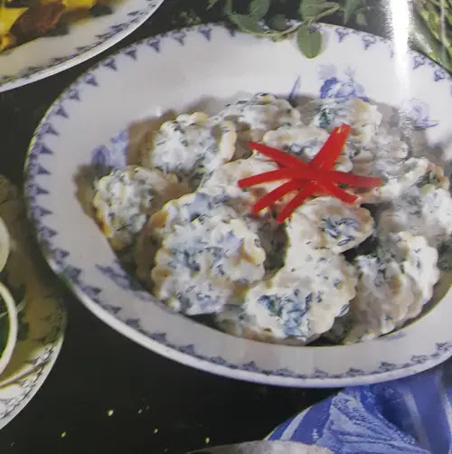 image of LAMB RAVIOLI WITH MINTED YOGURT