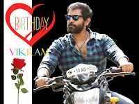 vikram birthday, dashing look vikram while riding bike in check shirt