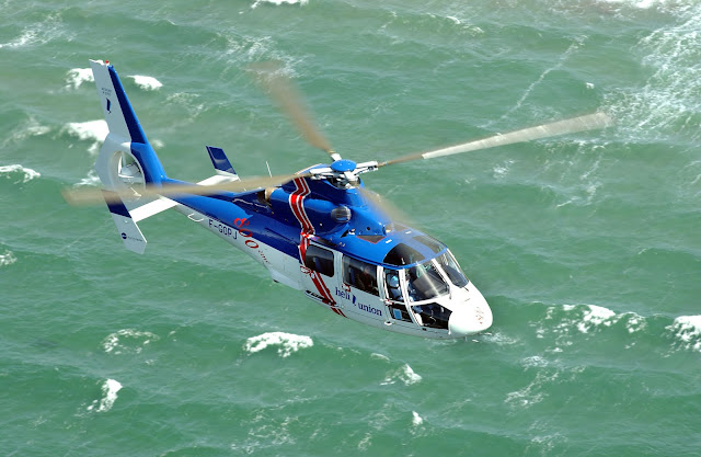 Eurocopter AS-365 Dauphin Cruising Over Ocean