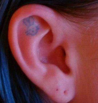 Unusual ear tattoos