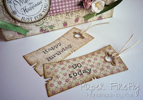 Apron card with raspberry and floral theme and pull-out tags