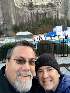 A photo of David Brodosi and his wife enjoying the first snow of the year