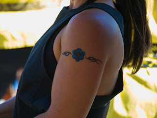 tribal tattoos on arm and shoulder