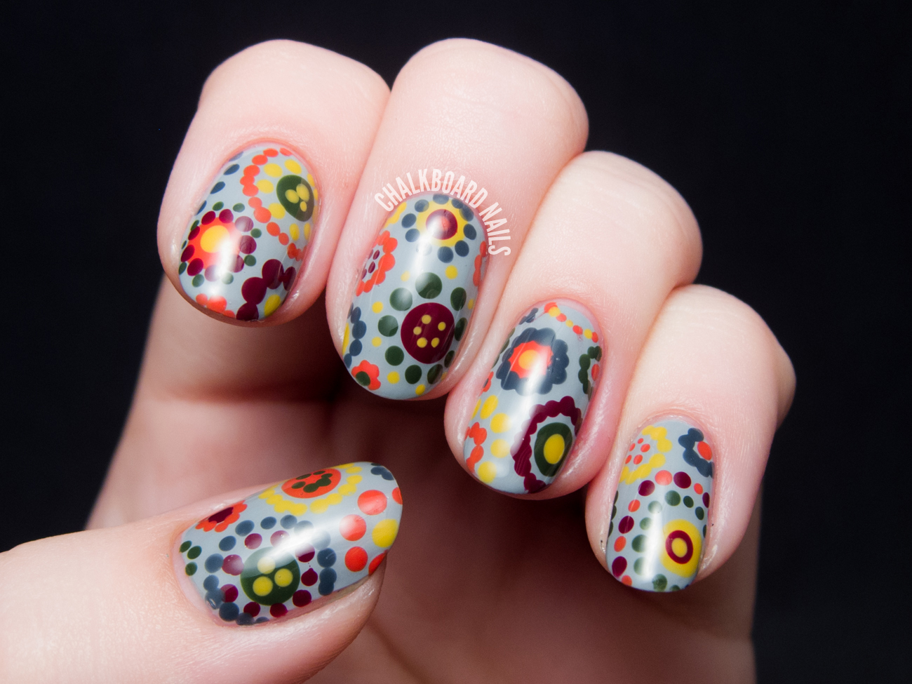 70's dotted floral nail art by @chalkboardnails