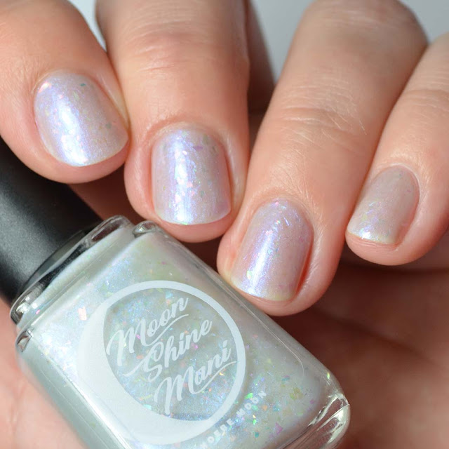 grey nail polish with flakies and shimmer