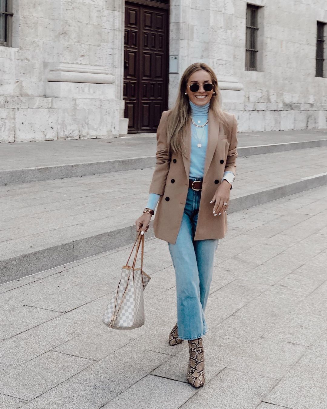 This Outfit Is Ready to Wear Anywhere — @virginiardgcasado Instagram look light blue turtleneck, tan blazer, wide-leg crop jeans, and snakeskin boots