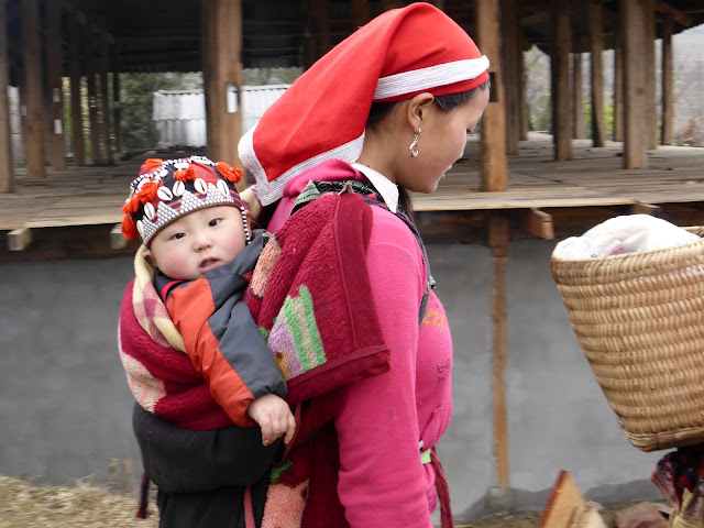 Baby being carried in Sapa Valley Vietnam 