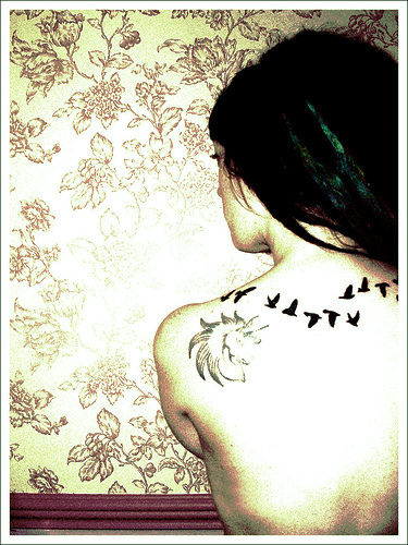 love bird tattoos. How about a tattoo of a. I want something like this only