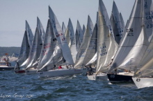 J/24 one-design sailboats- sailing to starting line