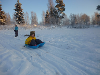 kids playing in the snow