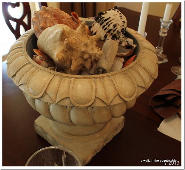 seashells in urn as centerpiece