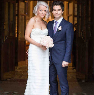 Jakki Healy with spouse Kelly Jones in their wedding dress