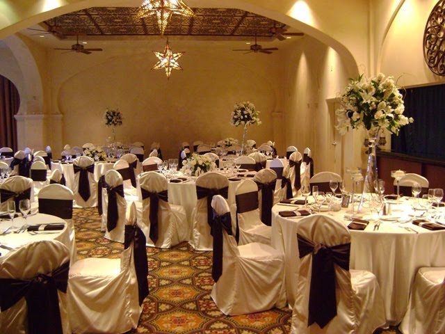 The room d cor was elegant and classy with centerpieces of stargazer lilies