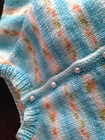 Detail of the cardigan front.