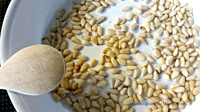 roasting pine kernels for dandelion pesto