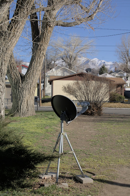 A satellite TV dish, photo by James's Ledbetter.