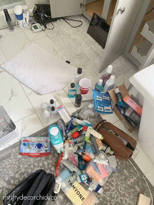 cleaning up mess under bathroom sink