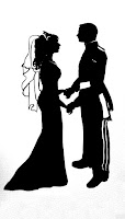 A full length silhouette of wedding couple.  The Groom in uniform.