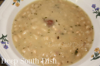 A simple bean soup, made with navy beans, ham hocks, onion, celery and a few dried herbs. Simple. Easy. Tasty!