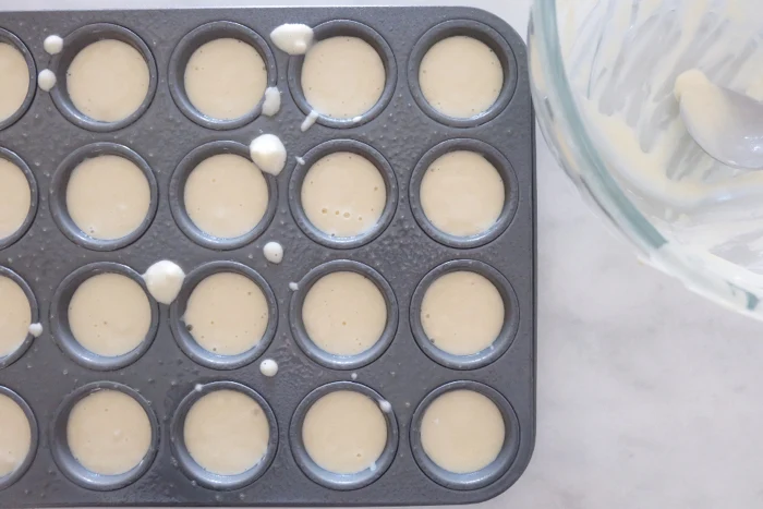 batter in mini muffin tin