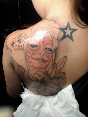 star outline tattoo