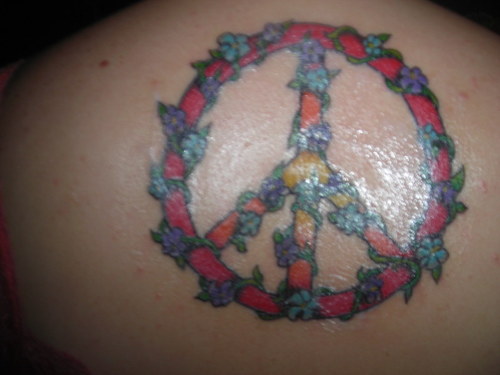 peace tattoos. peace sign tattoos. peace sign