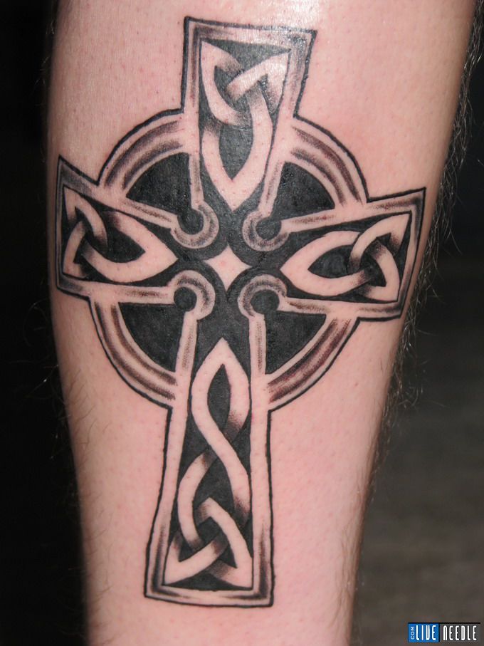 The origin of the Celtic cross tattoo designs has been lost in history.