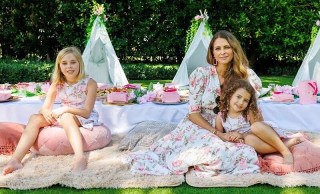 Princess Madeleine wore a Hampshire dress by D'Ascoli x Maisonette. Princesses Leonore and Adrienne wore a Winchester dress by D'Ascoli