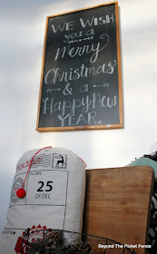 entryway, chalkboard, santa sack, pinecones, old school desk, typewriter, https://goo.gl/xpejCP