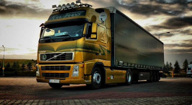 gambar truk box volvo gold