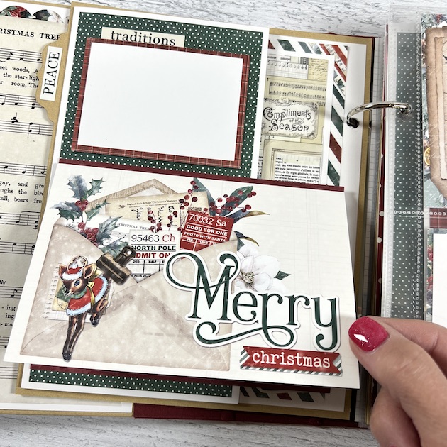 Noel Christmas Scrapbook Album Page with envelope, tckets, holly leaves and berries, and musical notes