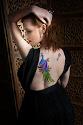 Feathers tattoos could be in colored form like peacock feather tattoos or in . (feather tattoos art designs )